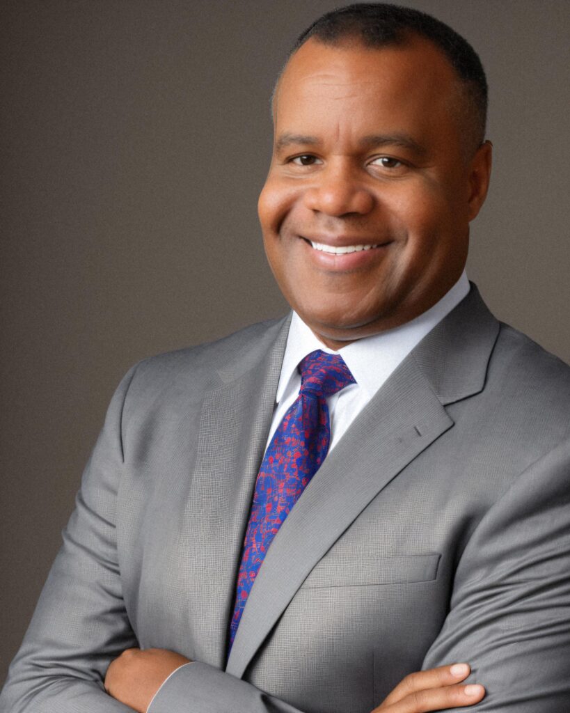 man purple tie headshot